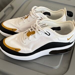Nike White and Gold Athletic Shoes